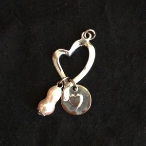 Silver and pearl heart shaped pendant